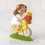 Figura pastel niña Comunión en bici 