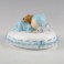 Figura niño para pastel y hucha bebé almohada azul 16x10x14cm